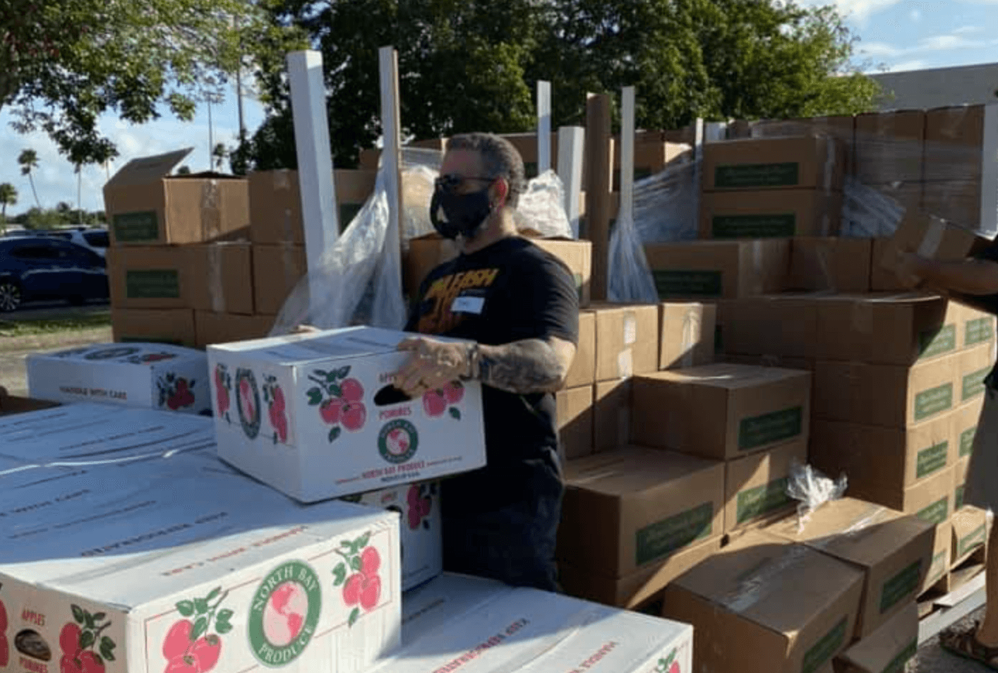 Todd Brown handing out food